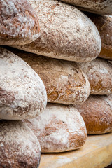 Many loaves of bread in a bakery