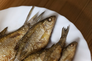 Fried fishes on a plate