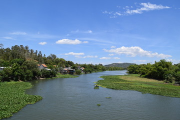 rural houses village near the river bank