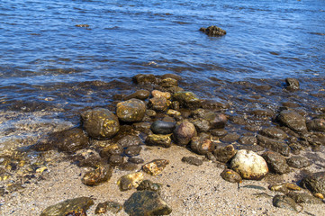 Stone beach and sea shore background