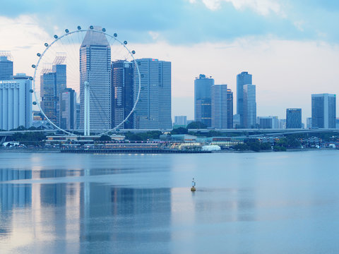 SINGAPORE , 31 AUG 2016, Singapore flyer and Singapore city at evening