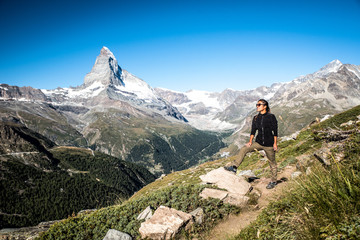 Matterhorn - Hiker in beautiful landscape of Zermatt, Switzerlan