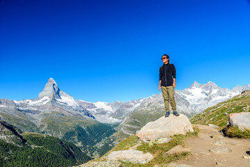 Matterhorn - Hiker in beautiful landscape of Zermatt, Switzerlan