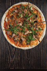 Pizza with chicken and mushrooms