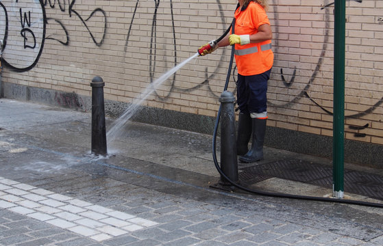 City workers - cleaning and washing of city streets