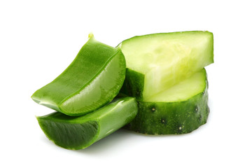 Leaves of aloe Vera and slices of cucumber close-up.