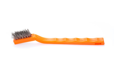 worn out wire brush with plastic handle on white background