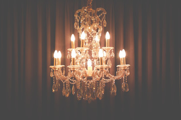 Vintage shining chandelier and curtain