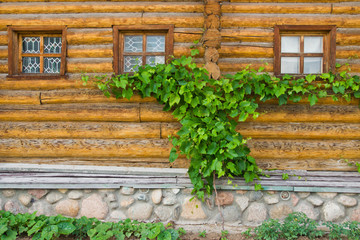 windows in wooden frames on a wall