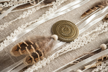 feathers, pearls, wooden beads