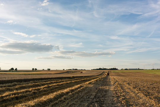 Farm fields in the beginning twilight after harvest day