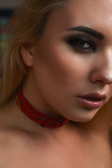 Beauty Woman with red leather Collar