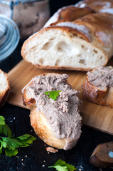 mousse, pate in a jar with baguette and parsley