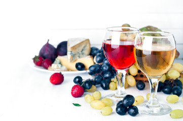 red and white wine in glasses on the table