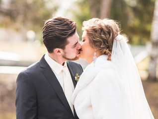 bride and groom kissing