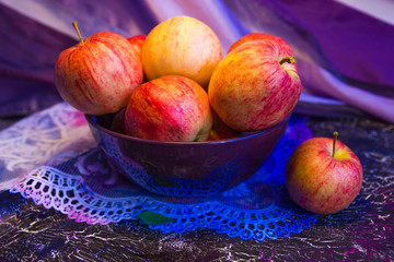 Pink apples in a bowl