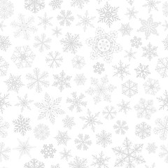 Seamless pattern of snowflakes, gray on white