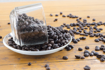 coffee beans and coffee cup on white background