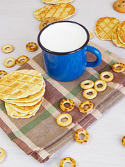 Mug of milk with cookies