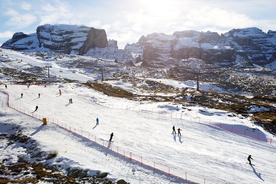The ski slope and skiers, Madonna di Campiglio, Italy.
