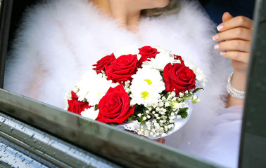 nice wedding bouquet in bride's hand.