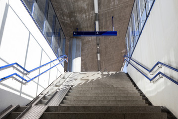 Fototapeta premium stairs with Ramps for strollers and bicycles at the railway station