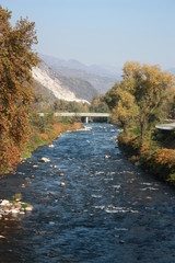 Autumn time the river Strona in Gravellona Toce, Piedmont Italy
