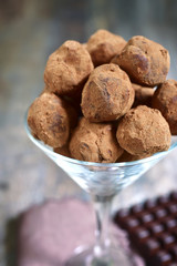 Homemade chocolate truffles in a glass.