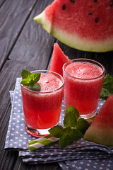 Glasses of watermelon smoothie with mint