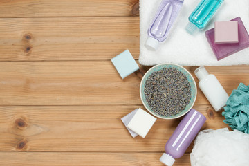 Fototapeta na wymiar Toiletry Set. Soap Bar And Liquid. Dried Lavender Petals. Shampo