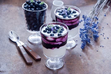 Foto op Canvas Blueberry dessert with lavender flowers © letterberry