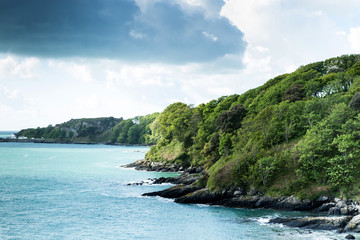 Fototapeta premium Blue sea with clouds seen from the island of Jersey Channel