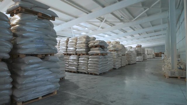In a warehouse in bags rice, groats and a flour is prepared for sending to the consumer.