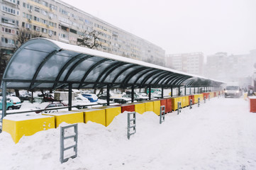 Market stalls covered in snow