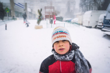 Fototapeta na wymiar Child in freezing cold weather