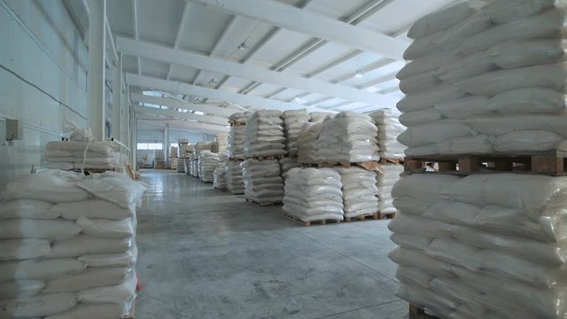 In a warehouse in bags rice, groats and a flour is prepared for sending to the consumer.
