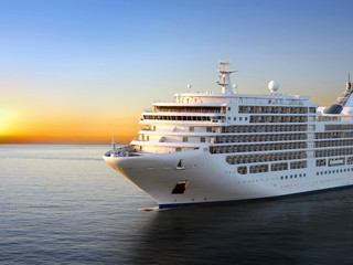 Fototapeta Luxury cruise ship sailing from port on sunset  obraz