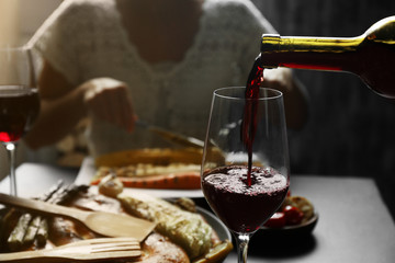 Delicious dinner with grilled vegetables and wine