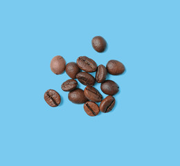 Coffee beans on blue background