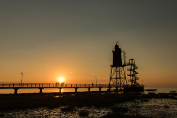 Wurster Nordseeküste - alter Leuchtturm Wurster Nordseeküste - Obereversand mit Beobachtern des Sonnenuntergangs