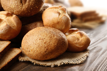 Fresh bread on wooden table