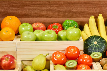 Arrangement ripe fruits  in container at  supermarket