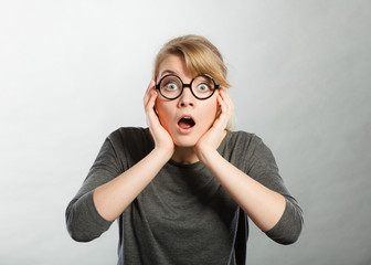 Shocked lady expressing awe.