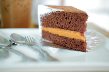 cake with chocolate  and milk tea