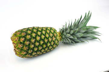 pineapple laying on white background
