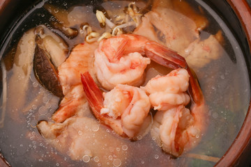 Bowl of spicy seafood soup at a Chinese restaurant
