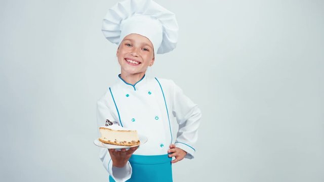 Baker enters the frame with plate piece of cheesecake and gives you it. Isolated on white