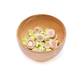 Obraz na płótnie Canvas Lemongrass on wooden bowl isolated on white background