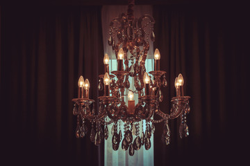 Vintage shining chandelier and curtain