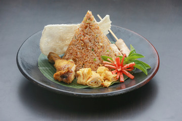 Traditional indonesian food - fried rice with meat and eggs

